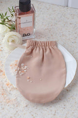 Silk accessories including scrunchies, exfoliating gloves, and elegant pouches. Thoughtfully designed luxury essentials that complete your nighttime sanctuary, supporting self-care rituals, organization, and refined everyday comfort.